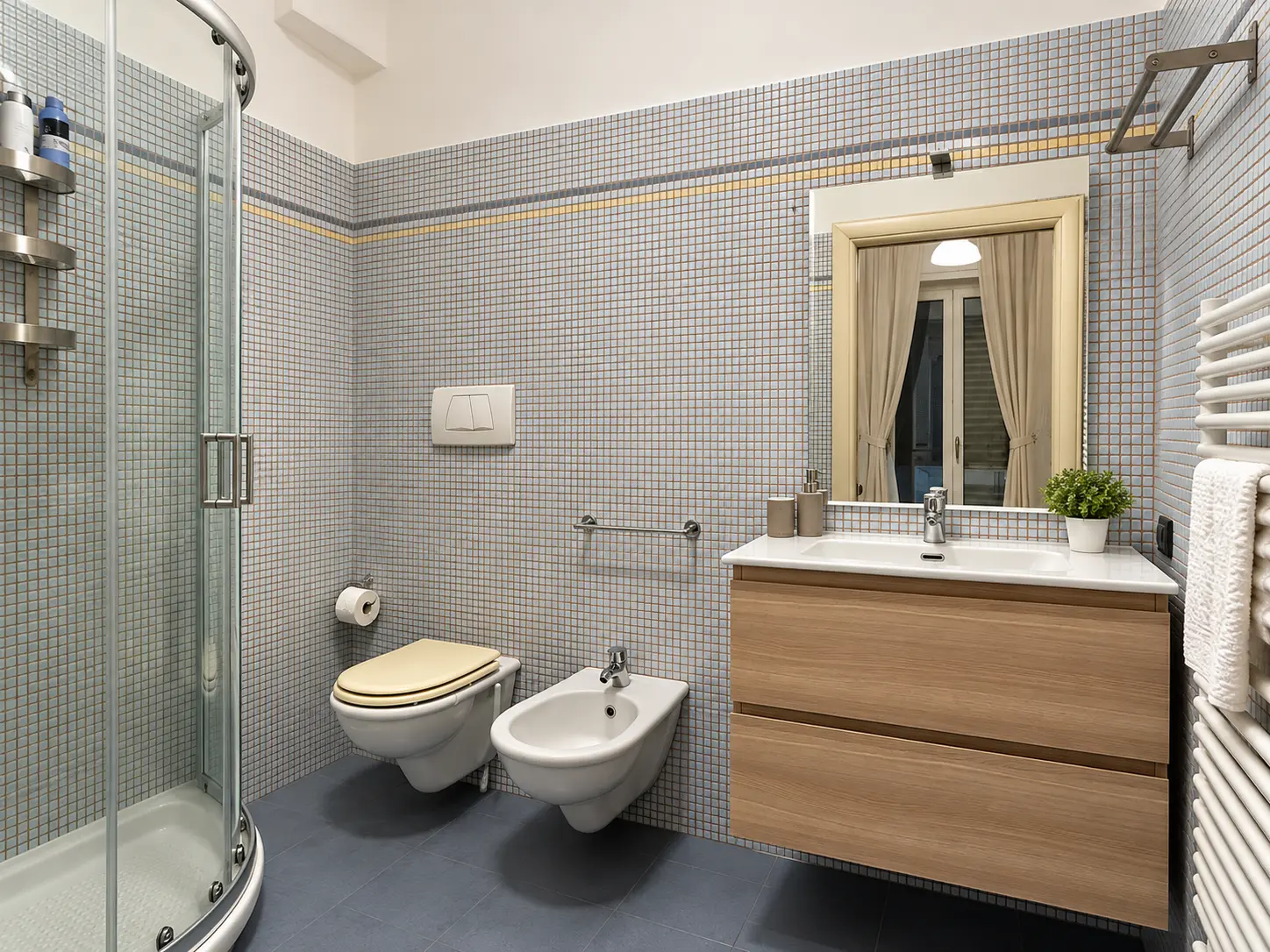 The Urban Ravanas bathroom with mosaic tiles and shower